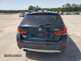 2013 BMW X1 28i z VIN WBAVM1C59DVW41709, wystawiony jako Copart lot #57316485 z przebiegiem 115 563 mil mil oraz Tytuł czysty. Historia ofert i sprzedaży dostępna na DreamBid. Obrazek 6.