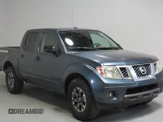 2014 Nissan Frontier SV with VIN 1N6AD0ERXEN763554, listed as a Copart auction lot 64313295 with 109,756 mi miles and Salvage title. Bid and sale history available at DreamBid. Image 1.