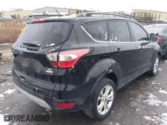2017 Ford Escape SE with VIN 1FMCU0GD5HUD08968, listed as a IAAI auction lot 42008576 with 95,363 mi miles and . Bid and sale history available at DreamBid. Image 4.