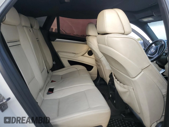 2012 BMW X6 50i z VIN 5UXFG8C59CL590549, wystawiony jako Copart lot #53071175 z przebiegiem 67 390 mil mil oraz Szkoda całkowita • Salvage title. Historia ofert i sprzedaży dostępna na DreamBid. Obrazek 10.