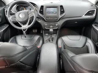 2019 Jeep Cherokee Altitude with VIN 1C4PJMLX1KD471582, listed as a Copart auction lot 55729055 with 76,941 mi miles and Salvage title. Bid and sale history available at DreamBid. Image 8.