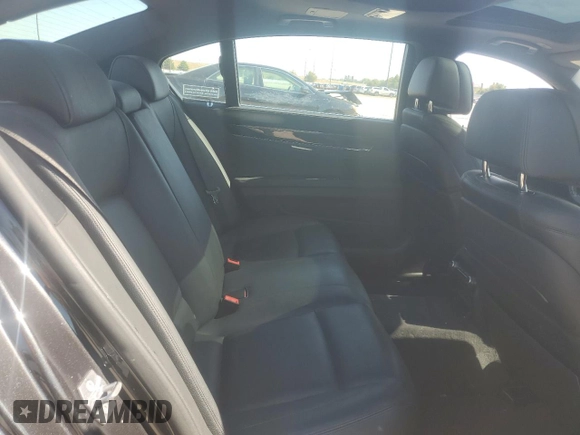 2014 BMW 7 Series 740Li with VIN WBAYE4C59ED138376, listed as a Copart auction lot 76878354 with 73,129 mi miles and Salvage Title. Bid and sale history available at carsss.com. Image 10.