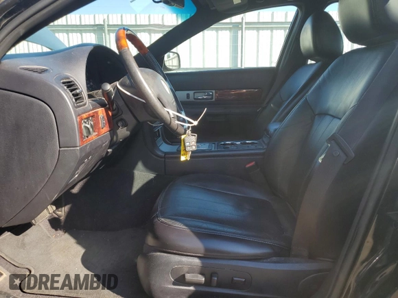 2006 Lincoln LS Sport z VIN 1LNHM87A26Y639295, wystawiony jako Copart lot #56240245 z przebiegiem 124 023 mil mil oraz Szkoda całkowita • Salvage title. Historia ofert i sprzedaży dostępna na DreamBid. Obrazek 7.