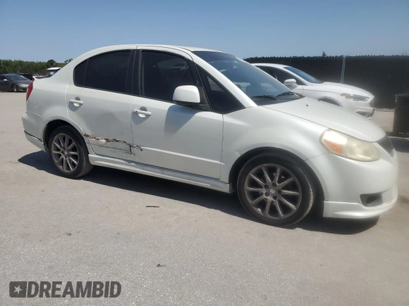 2009 Suzuki SX4 z VIN JS2YC416396200021, wystawiony jako Copart lot #56676075 z przebiegiem 150 981 mil mil oraz Szkoda całkowita • Salvage title. Historia ofert i sprzedaży dostępna na DreamBid. Obrazek 4.