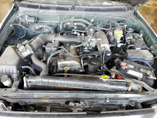 1999 Toyota Tacoma with VIN 4TAPM62N9XZ555738, listed as a Copart auction lot 78293634 with 210,096 mi miles and Salvage Title. Bid and sale history available at DreamBid. Image 11.