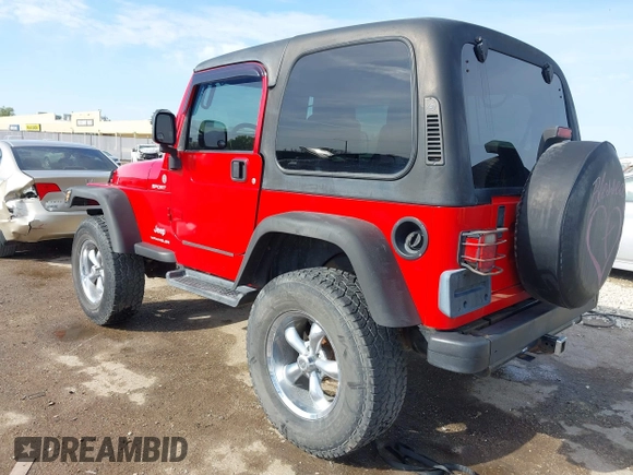 2004 Jeep Wrangler Sport with VIN 1J4FA49S54P744171, listed as a IAAI auction lot 41974657 with 173,230 mi miles. Bid and sale history available at carsss.com. Image 3.