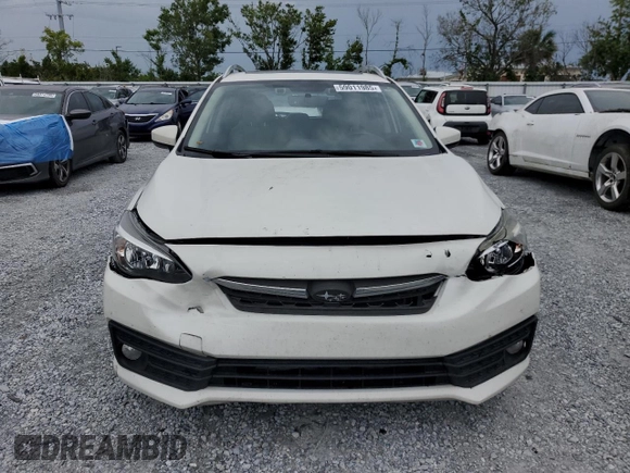 2022 Subaru Impreza Premium with VIN 4S3GTAD66N3710522, listed as a Copart auction lot 59011985 with 42,962 mi miles and Salvage title. Bid and sale history available at DreamBid. Image 5.