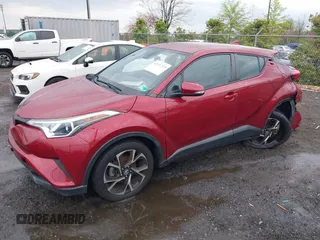 2019 Toyota C-HR XLE with VIN NMTKHMBX0KR088761, listed as a IAAI auction lot 42037328 with 28,501 mi miles and . Bid and sale history available at DreamBid. Image 14.