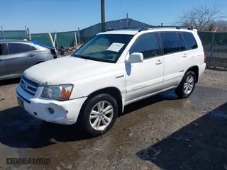 2006 Toyota Highlander Hybrid with VIN JTEEW21A060021409, listed as a IAAI auction lot 41774041 with 230,714 mi miles. Bid and sale history available at carsss.com. Image 17.