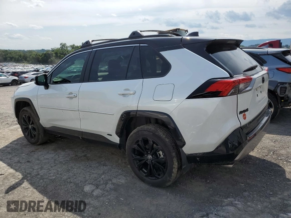 2023 Toyota RAV4 Hybrid XSE with VIN 2T3E6RFVXPW040152, listed as a Copart auction lot 61645565 with 26,408 mi miles and Salvage title. Bid and sale history available at DreamBid. Image 2.