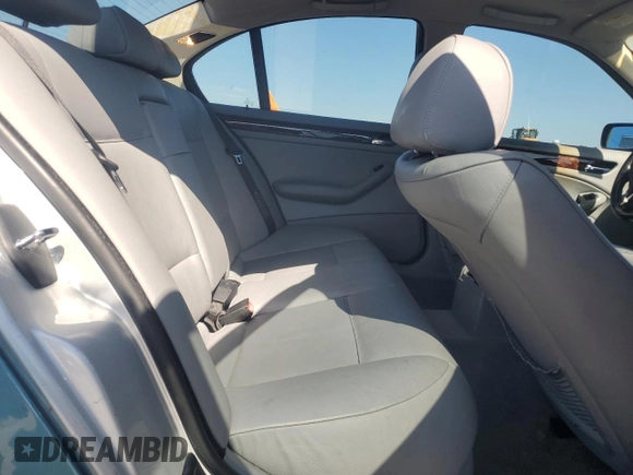 2005 BMW 3 Series 325i with VIN WBAEV33435KW17599, listed as a Copart auction lot 60297355 with 155,914 mi miles and Clean title. Bid and sale history available at DreamBid. Image 10.