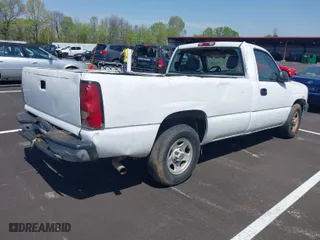 2004 Chevrolet Silverado 1500 Work Truck with VIN 1GCEC14X24Z194557, listed as a IAAI auction lot 42002678 with 116,877 mi miles. Bid and sale history available at carsss.com. Image 4.