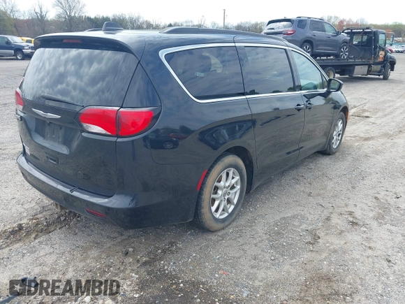 2021 Chrysler Voyager LXi with VIN 2C4RC1DG5MR532190, listed as a IAAI auction lot 42007631 with 101,280 mi miles and . Bid and sale history available at DreamBid. Image 4.