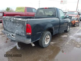2002 Ford F-150 XL with VIN 1FTRF17222NB42472, listed as a IAAI auction lot 42465261 with 148,948 mi miles and . Bid and sale history available at DreamBid. Image 4.
