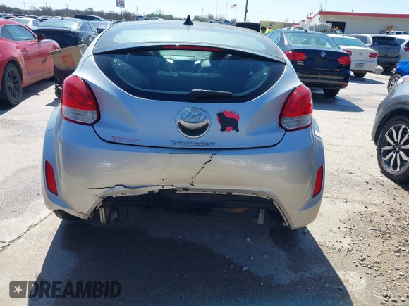2013 Hyundai Veloster w/Black Int z VIN KMHTC6AD3DU092305, wystawiony jako IAAI lot #41721717 z przebiegiem 158 534 mil mil oraz . Historia ofert i sprzedaży dostępna na DreamBid. Obrazek 6.