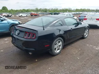 2014 Ford Mustang V6 with VIN 1ZVBP8AM5E5226188, listed as a IAAI auction lot 42181615 with 70,748 mi miles and . Bid and sale history available at carsss.com. Image 4.