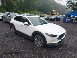 2022 Mazda CX-30 S Premium with VIN 3MVDMBDL3NM423566, listed as a IAAI auction lot 42524026 with 42,078 mi miles and . Bid and sale history available at DreamBid. Image 1.