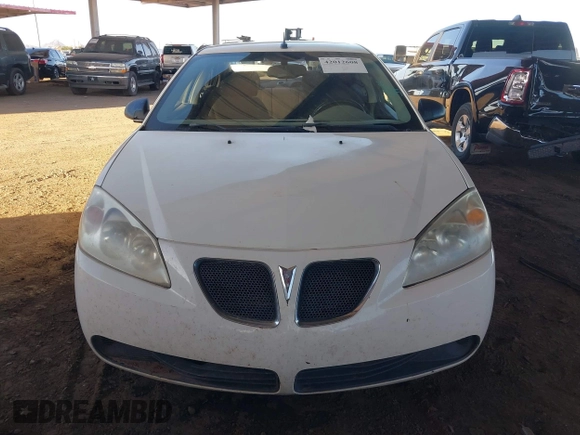 2008 Pontiac G6 1SV Value Leader z VIN 1G2ZF57B584242107, wystawiony jako IAAI lot #42012608 z przebiegiem Nie podano mil oraz . Historia ofert i sprzedaży dostępna na DreamBid. Obrazek 11.