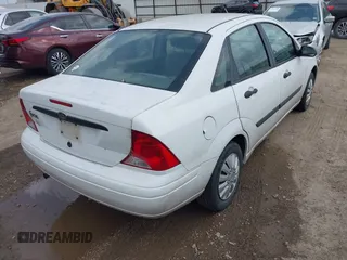 2003 Ford Focus LX with VIN 1FAFP33P33W156797, listed as a IAAI auction lot 42086475 with 200,727 mi miles and . Bid and sale history available at carsss.com. Image 4.