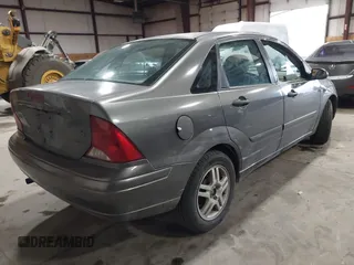 2003 Ford Focus SE with VIN 1FAFP34333W164636, listed as a IAAI auction lot 41412000 with 175,276 mi miles and . Bid and sale history available at carsss.com. Image 4.