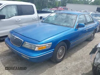 1996 Mercury Grand Marquis LS z VIN 2MELM75W0TX655576, wystawiony jako IAAI lot #42059805 z przebiegiem 46 837 mil mil oraz . Historia ofert i sprzedaży dostępna na DreamBid. Obrazek 2.
