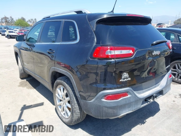 2014 Jeep Cherokee Limited with VIN 1C4PJMDB9EW210180, listed as a IAAI auction lot 41302037 with 75,177 mi miles and . Bid and sale history available at DreamBid. Image 3.