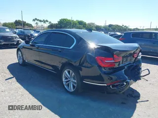 2018 BMW 7 Series 750i with VIN WBA7F0C54JGM22900, listed as a IAAI auction lot 41673673 with 66,264 mi miles. Bid and sale history available at carsss.com. Image 3.