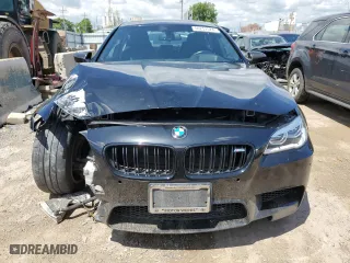 2015 BMW M5 with VIN WBSFV9C55FD595221, listed as a Copart auction lot 56251524 with 38,648 mi miles and Salvage Title. Bid and sale history available at carsss.com. Image 5.