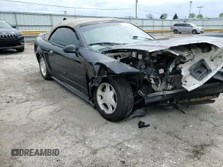 1999 Ford Mustang z VIN 1FAFP4444XF204789, wystawiony jako Copart lot #55103615 z przebiegiem Nie podano mil oraz Czysty tytuł • Clean title. Historia ofert i sprzedaży dostępna na DreamBid. Obrazek 14.