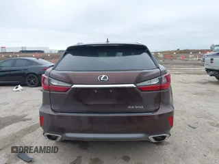 2016 Lexus RX 350 z VIN 2T2ZZMCA5GC029529, wystawiony jako IAAI lot #41953567 z przebiegiem 133 460 mil mil oraz . Historia ofert i sprzedaży dostępna na DreamBid. Obrazek 16.