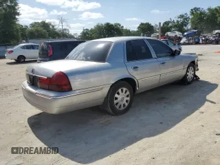 2003 Mercury Grand Marquis LS Premium with VIN 2MEHM75W63X697725, listed as a Copart auction lot 54485505 with 129,194 mi miles and Salvage Title. Bid and sale history available at DreamBid. Image 3.