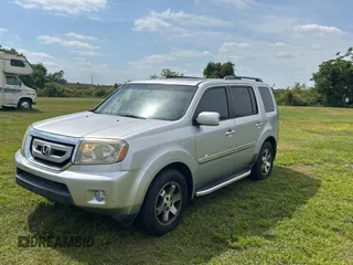 2010 Honda Pilot Touring with VIN 5FNYF3H86AB015716, listed as a Copart auction lot 54362235 with 229,256 mi miles and Clean Title. Bid and sale history available at carsss.com. Image 2.