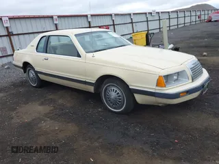 1984 Ford Thunderbird z VIN 1FABP4632EH182117, wystawiony jako IAAI lot #42244664 z przebiegiem 92 097 mil mil oraz . Historia ofert i sprzedaży dostępna na DreamBid. Obrazek 1.
