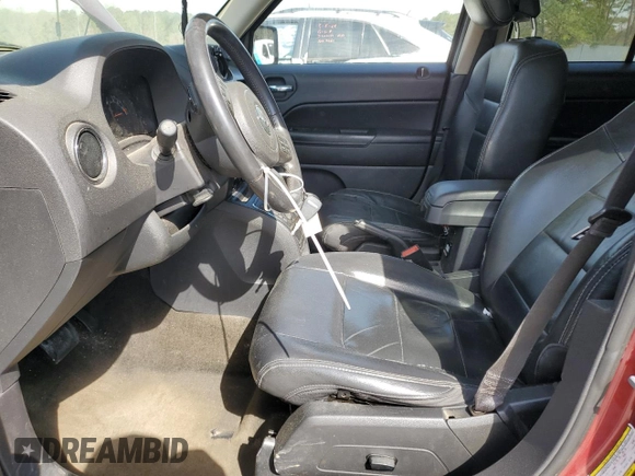 2014 Jeep Patriot Latitude with VIN 1C4NJPFA0ED856877, listed as a Copart auction lot 50406735 with 154,788 mi miles and Salvage Title. Bid and sale history available at carsss.com. Image 7.