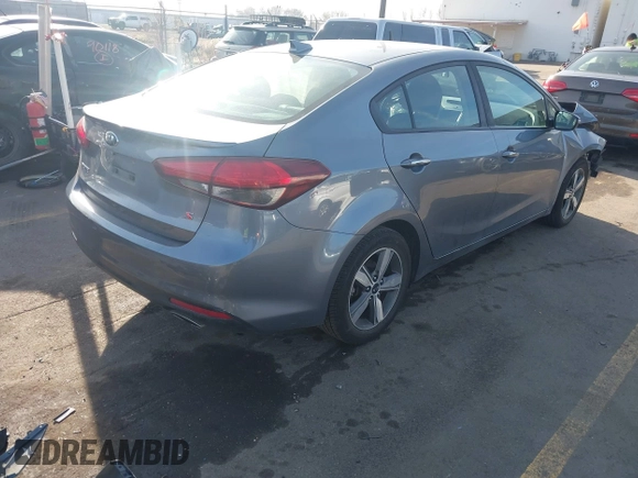 2018 Kia Forte LX with VIN 3KPFL4A73JE171175, listed as a IAAI auction lot 40983942 with 84,258 mi miles and . Bid and sale history available at DreamBid. Image 4.