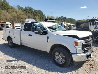2020 Ford F-250 XL with VIN 1FD7X2A60LEC75735, listed as a Copart auction lot 50137205 with 159,945 mi miles and Salvage title. Bid and sale history available at DreamBid. Image 4.