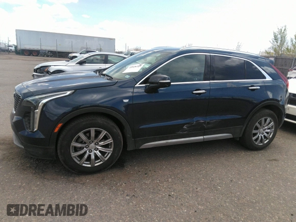 2021 Cadillac XT4 FWD Premium Luxury with VIN 1GYFZCR48MF004009, listed as a IAAI auction lot 41956723 with 82,483 mi miles. Bid and sale history available at carsss.com. Image 14.