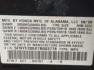 2007 Honda Pilot EX-L with VIN 5FNYF286X7B003778, listed as a IAAI auction lot 41390885 with 240,316 mi miles. Bid and sale history available at carsss.com. Image 9.