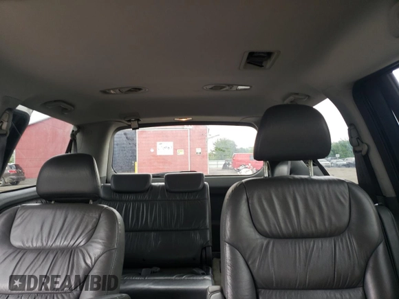 2007 Honda Odyssey EX with VIN 5FNRL38427B513477, listed as a Copart auction lot 62457695 with 216,977 mi miles and Salvage title. Bid and sale history available at DreamBid. Image 10.