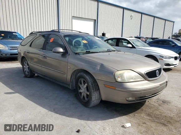 2003 Mercury Sable LS Premium z VIN 1MEFM59S03A606329, wystawiony jako Copart lot #79331624 z przebiegiem 152 059 mil mil oraz Nie do naprawy. Historia ofert i sprzedaży dostępna na DreamBid. Obrazek 4.