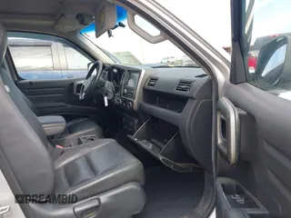 2009 Honda Ridgeline RTL with VIN 2HJYK16539H500986, listed as a IAAI auction lot 42084176 with 161,142 mi miles and . Bid and sale history available at DreamBid. Image 5.