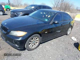 2007 BMW 3 Series 328xi with VIN WBAVC93547KX56693, listed as a IAAI auction lot 41852323 with 250,156 mi miles. Bid and sale history available at carsss.com. Image 2.
