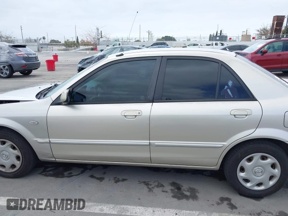 2002 Mazda Protege DX with VIN JM1BJ225121620394, listed as a IAAI auction lot 42043056 with 187,360 mi miles and . Bid and sale history available at DreamBid. Image 15.