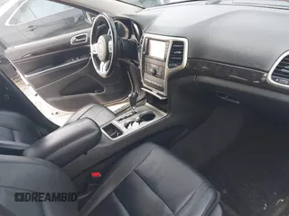 2012 Jeep Grand Cherokee Laredo with VIN 1C4RJFAG7CC189381, listed as a IAAI auction lot 41429085 with 137,238 mi miles. Bid and sale history available at carsss.com. Image 5.