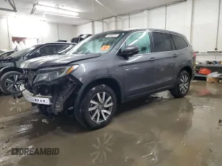 2019 Honda Pilot EX-L with VIN 5FNYF6H57KB038429, listed as a Copart auction lot 48065215 with 98,641 mi miles and Salvage Title. Bid and sale history available at carsss.com. Image 1.