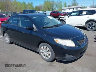 2009 Toyota Corolla with VIN JTDBL40E99J050275, listed as a IAAI auction lot 42147462 with 251,977 mi miles. Bid and sale history available at carsss.com. Image 1.