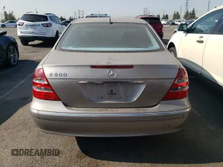 2005 Mercedes-Benz E 5.0L with VIN WDBUF70J75A693702, listed as a Copart auction lot 63497604 with 122,410 mi miles and Clean Title. Bid and sale history available at carsss.com. Image 6.