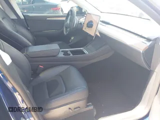 2023 Tesla Model Y Performance with VIN 7SAYGDEF9PF582908, listed as a IAAI auction lot 41930957 with 52,857 mi miles and . Bid and sale history available at DreamBid. Image 5.