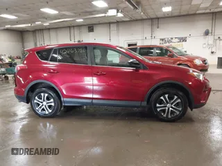 2018 Toyota RAV4 LE with VIN 2T3BFREV9JW825953, listed as a IAAI auction lot 42463780 with 74,128 mi miles and . Bid and sale history available at DreamBid. Image 13.