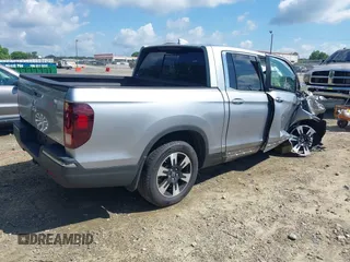 2020 Honda Ridgeline RTL with VIN 5FPYK3F5XLB025857, listed as a IAAI auction lot 42307343 with 97,262 mi miles and . Bid and sale history available at DreamBid. Image 4.